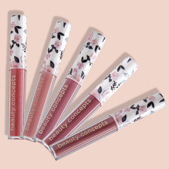 Beauty Concepts Lip Gloss Collection pink gloss bottle highlights long-wear shine for daily use.