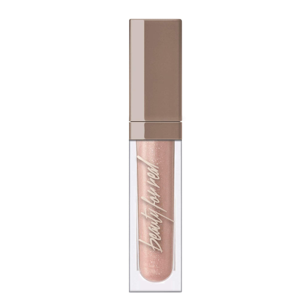 Beauty For Real Starlust lip gloss cap with LED light for precise application.