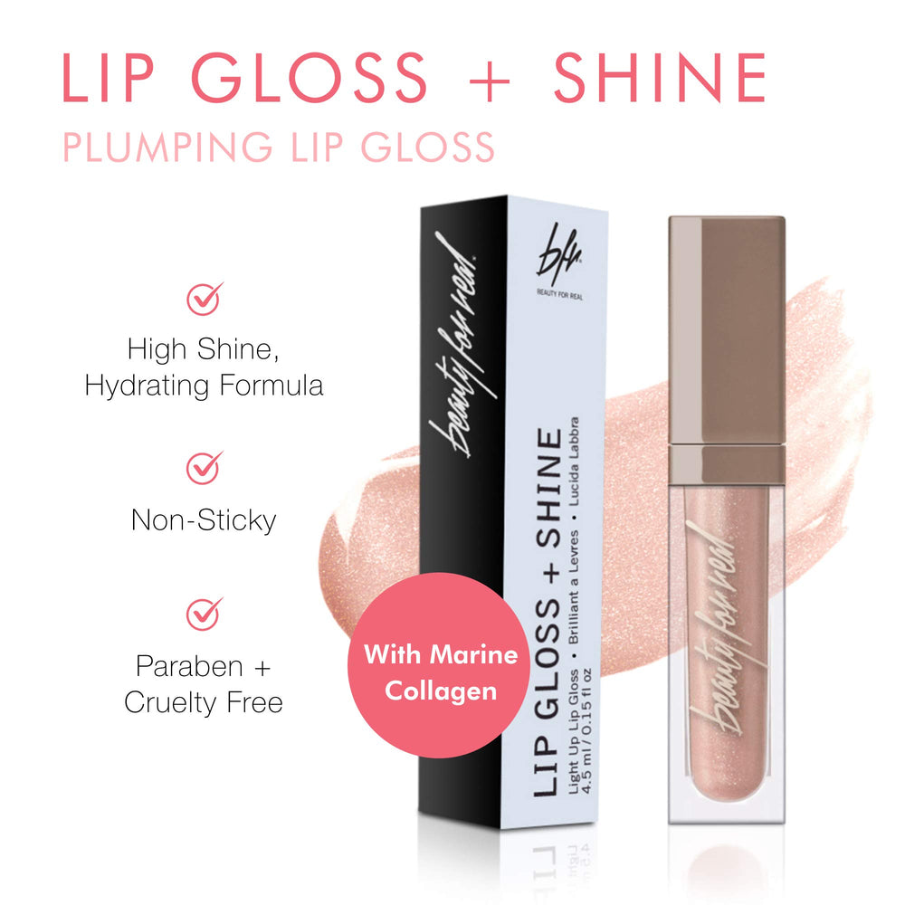 Beauty For Real Starlust lip gloss tube with mirrored cap for quick checks.