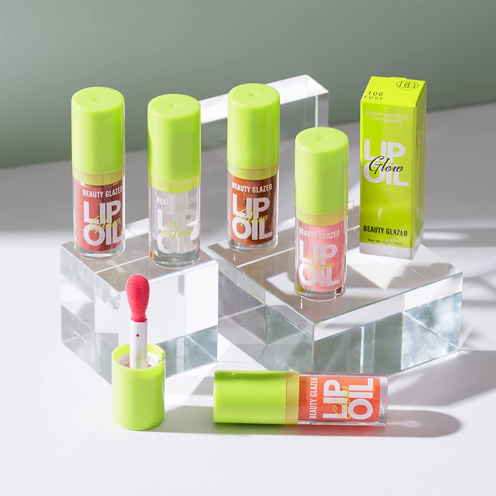 Beauty Glazed lip oil bottle close-up with premium branding.