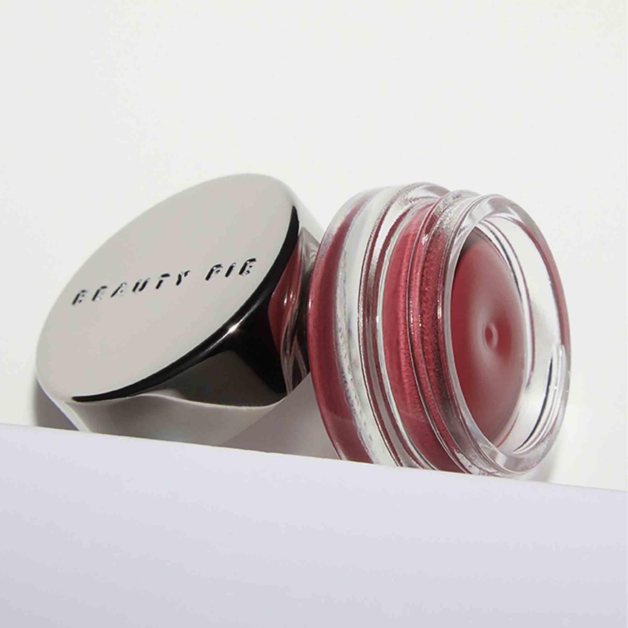 Beauty Pie Supercheek Cream Blush Sexy Berry application on cheek with soft matte finish.
