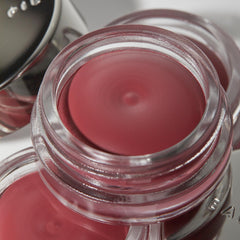 Beauty Pie Supercheek Cream Blush Sexy Berry swatch demonstrates blendable finish.