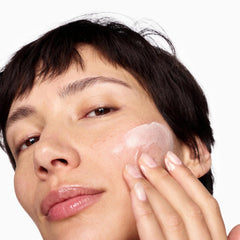 Beauty Pie Traceless sunscreen on skin—natural finish without white cast.