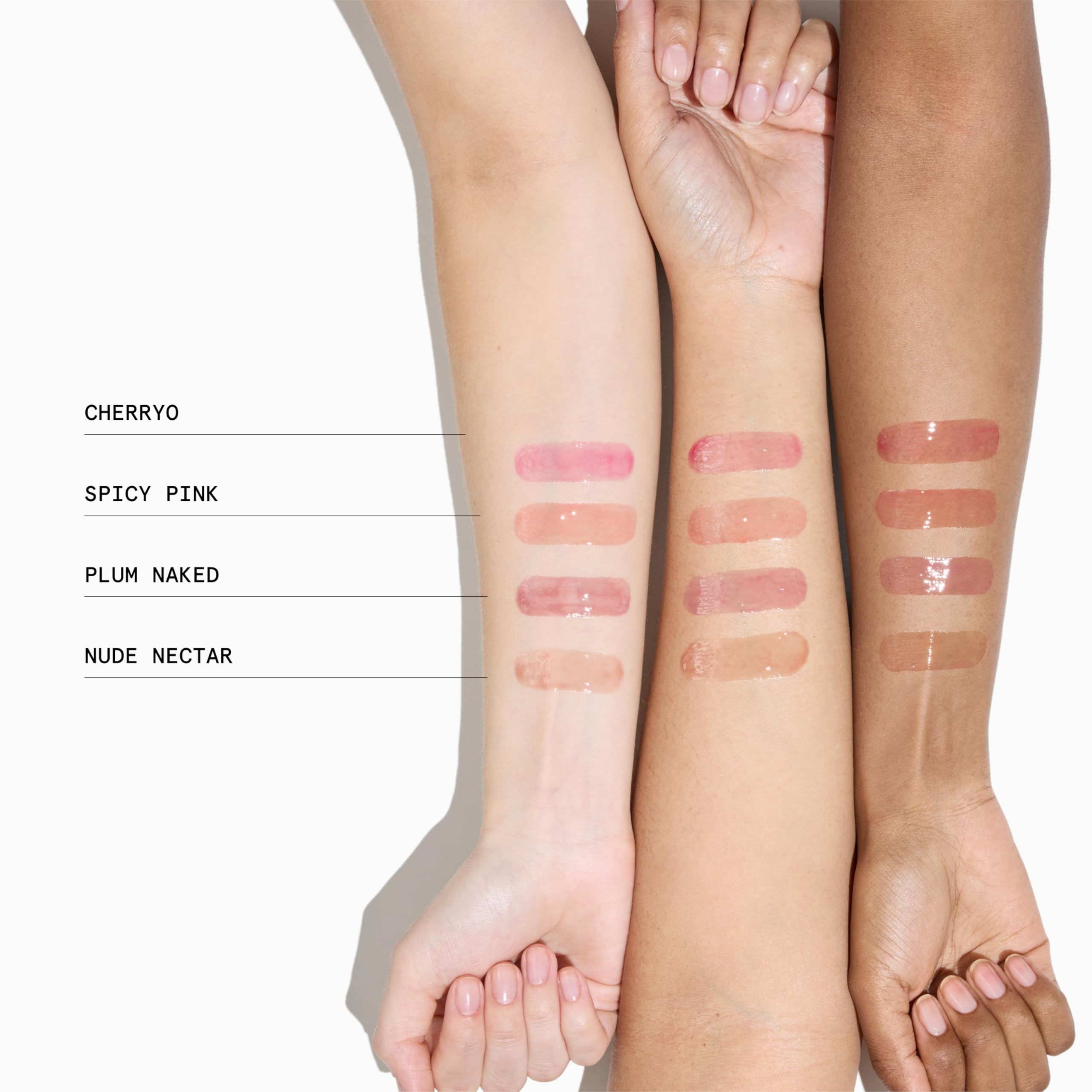 Application demo of Wondergloss lip oil with rosy tint.