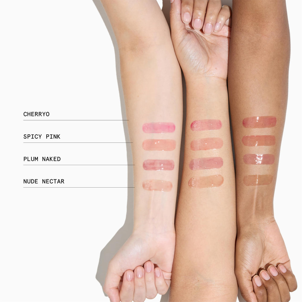 Application demo of Wondergloss lip oil with rosy tint.