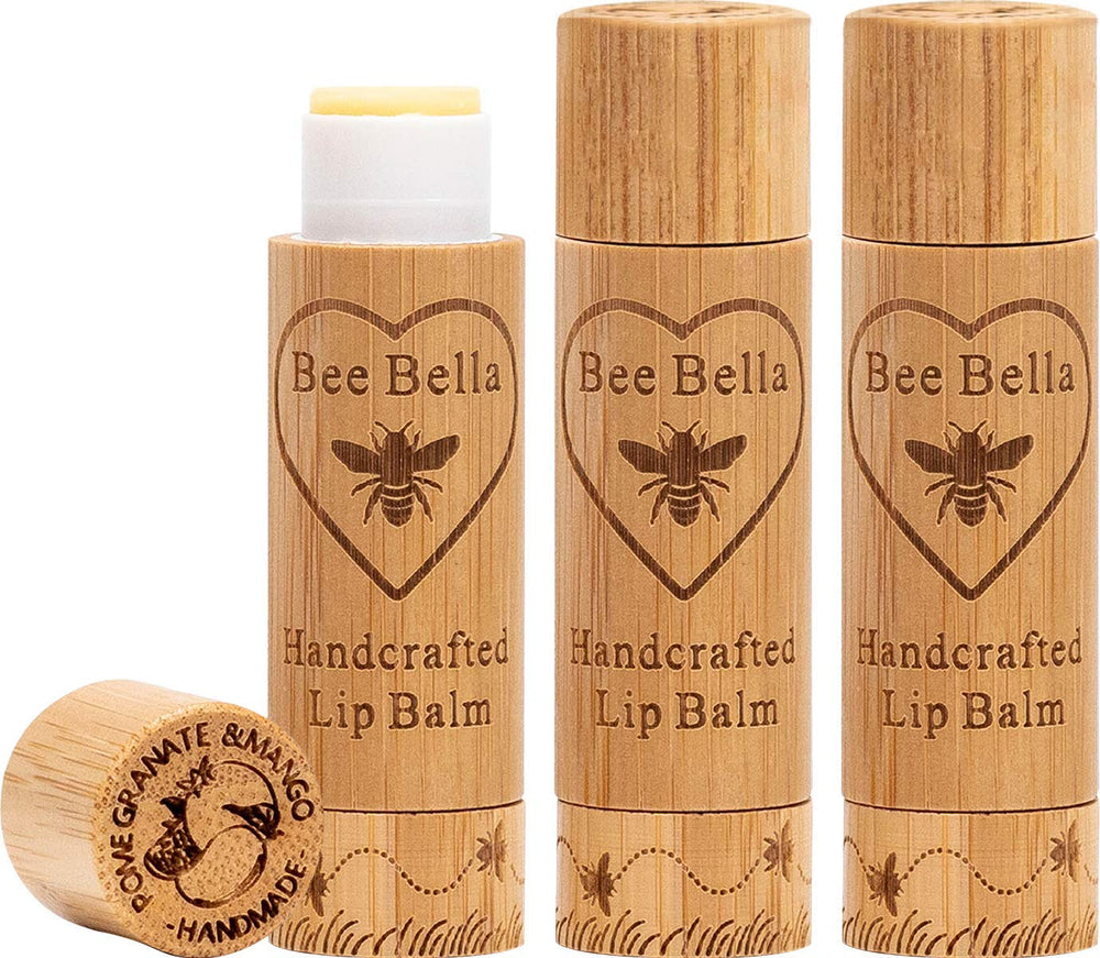 Bee Bella lip balm in pomegranate mango, front view showing hydrated lips