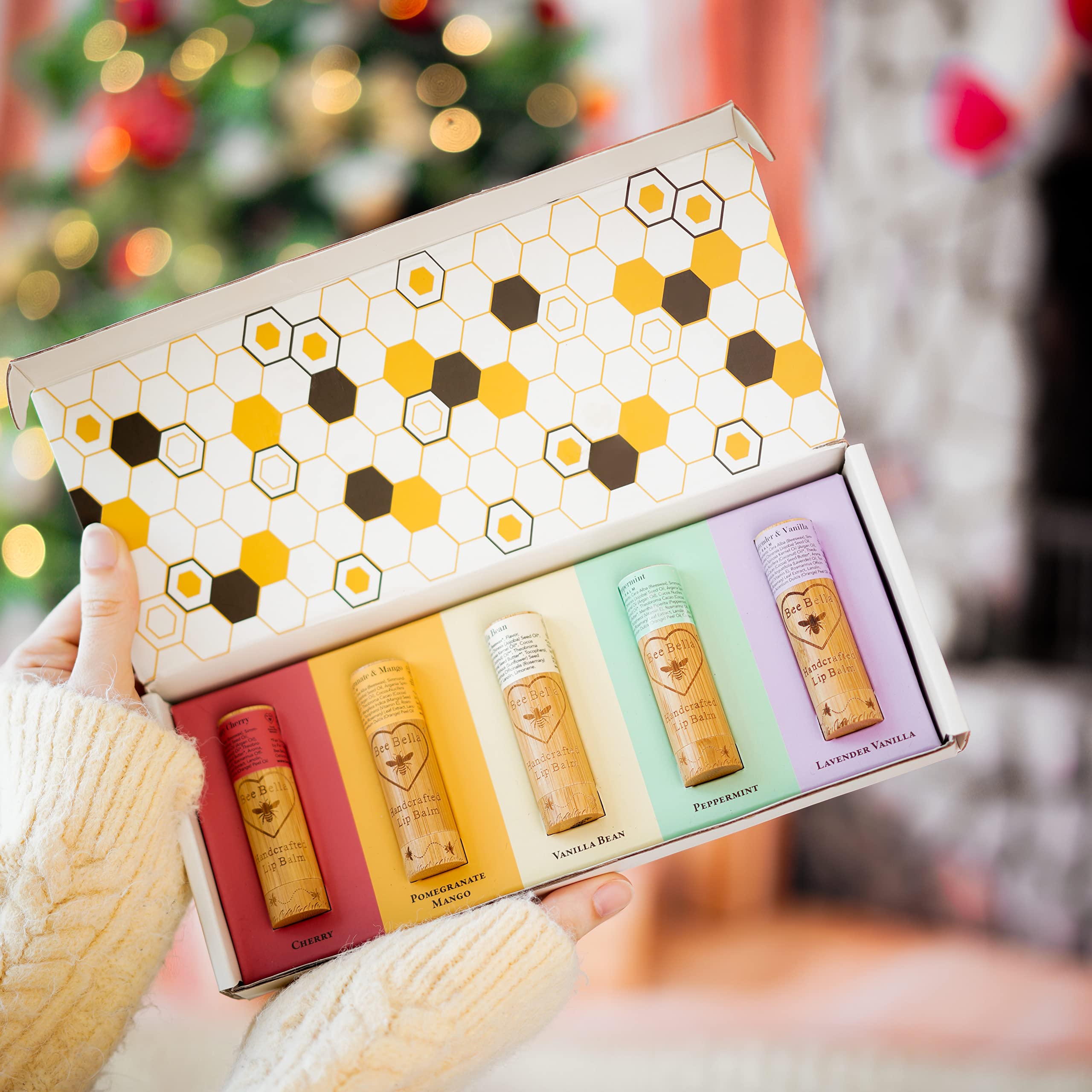 Bee Bella Lip Balm Pomegranate Mango offers tropical scent and protective moisture.