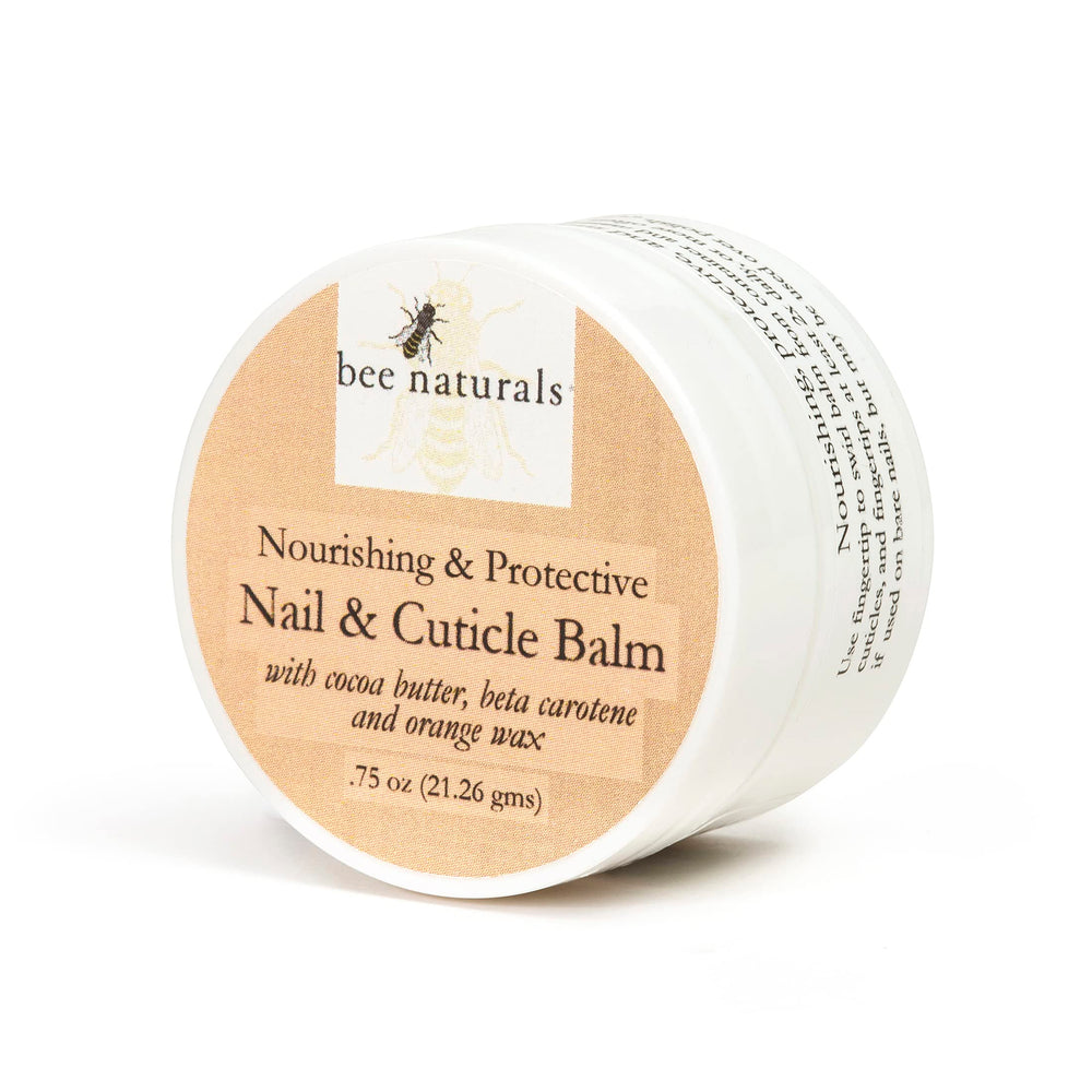 Bee Naturals balm shows shea butter and beeswax hydrating nails.