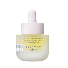 Beekman 1802 Collagen Booster bottle on white background, fragrance-free formula for sensitive skin.