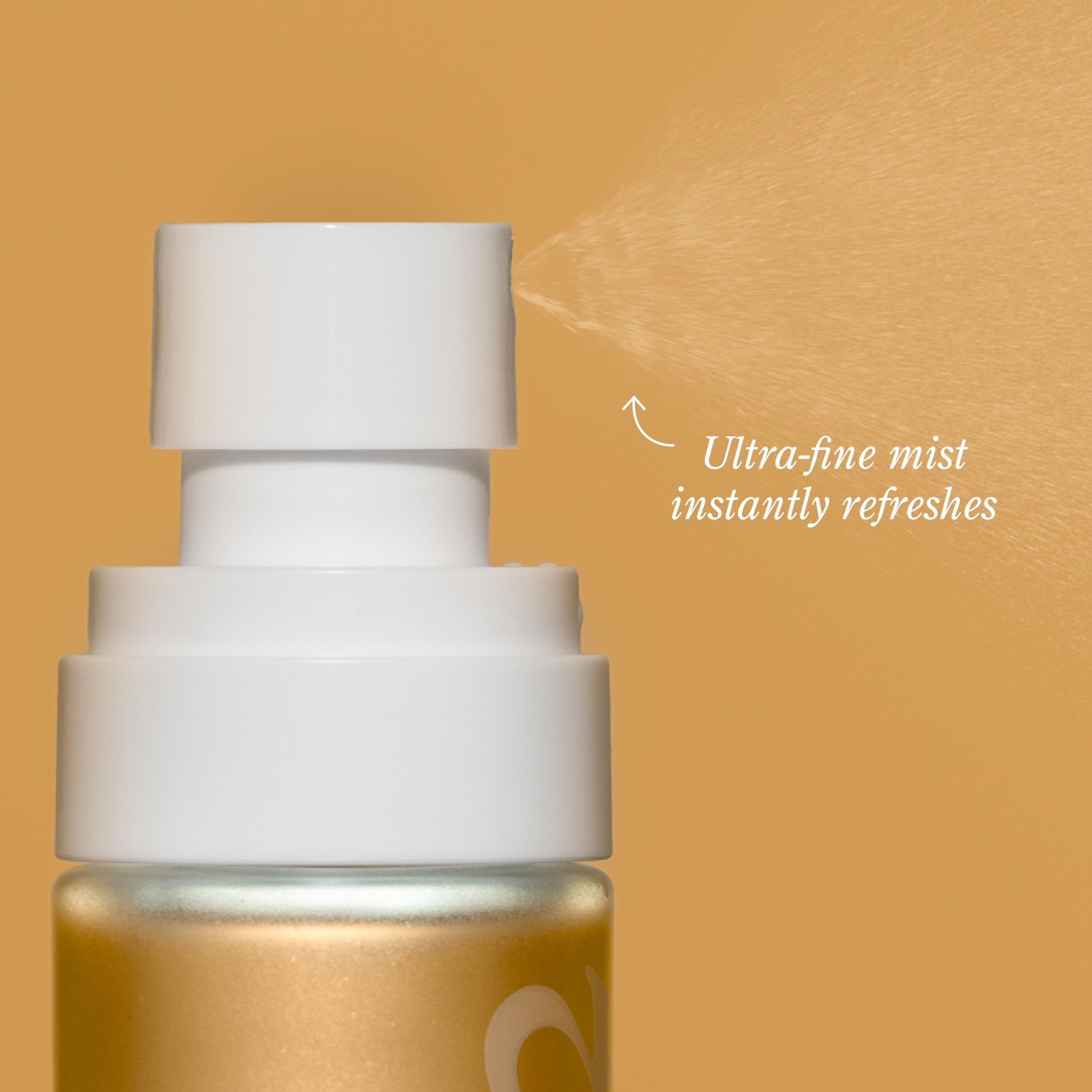 Beekman 1802 Milk Shake Body Mist coconut-cream bottle seen from a close-up angle.