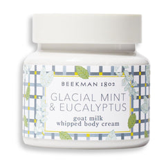 Beekman 1802 Whipped Body Cream bottle close-up highlights hydrating formula.