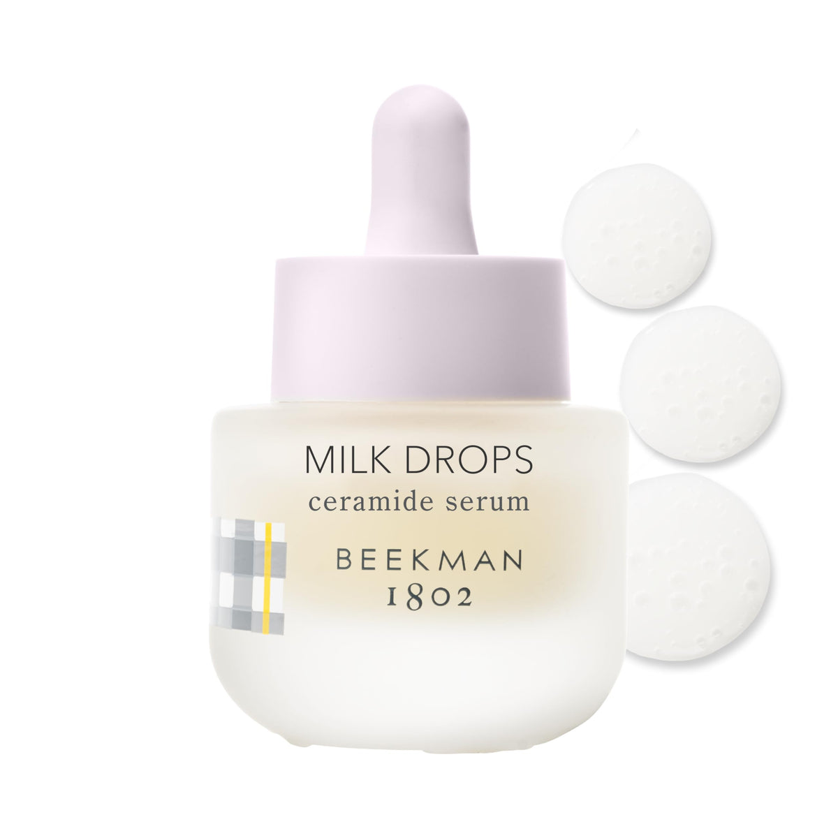 Beekman 1802 Milk Drops Ceramide Serum bottle highlights fragrance-free, hydrating formula for sensitive skin.