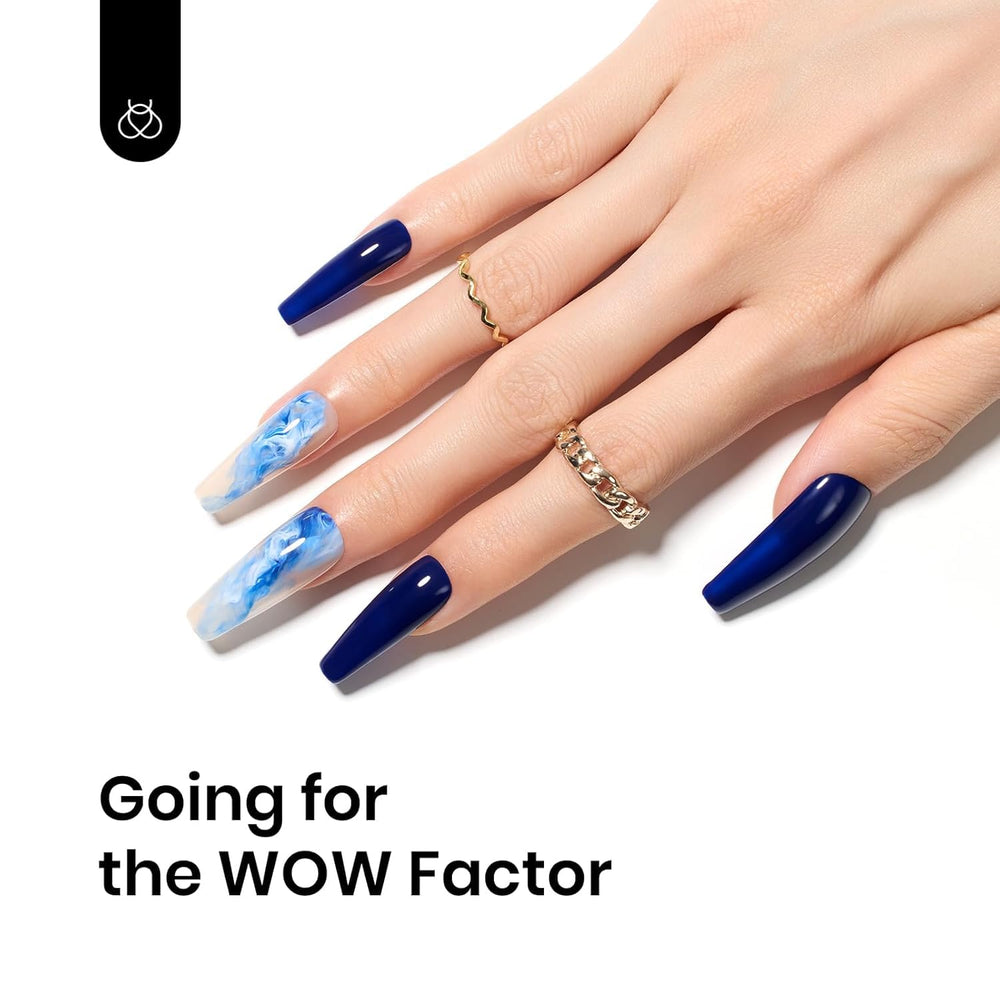 Beetles navy blue gel on nails shows glossy finish after curing.