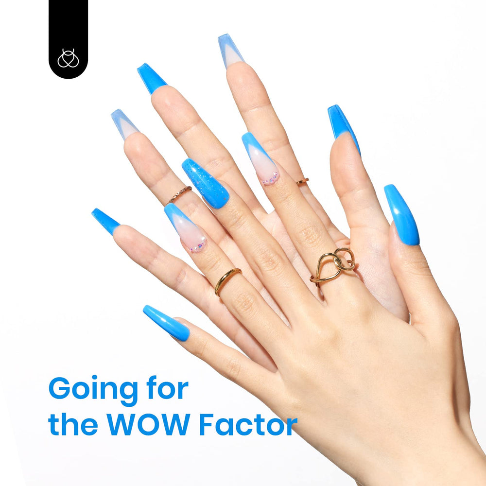 Beetles blue gel polish bottle with brush in action demonstrates easy at-home use