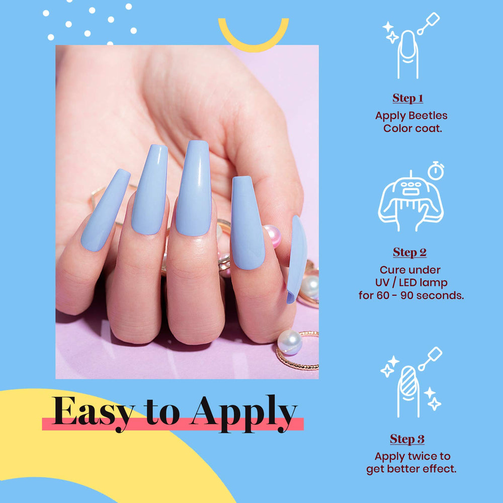 Beetles Blue Gel Polish curing under LED lamp for quick dry.