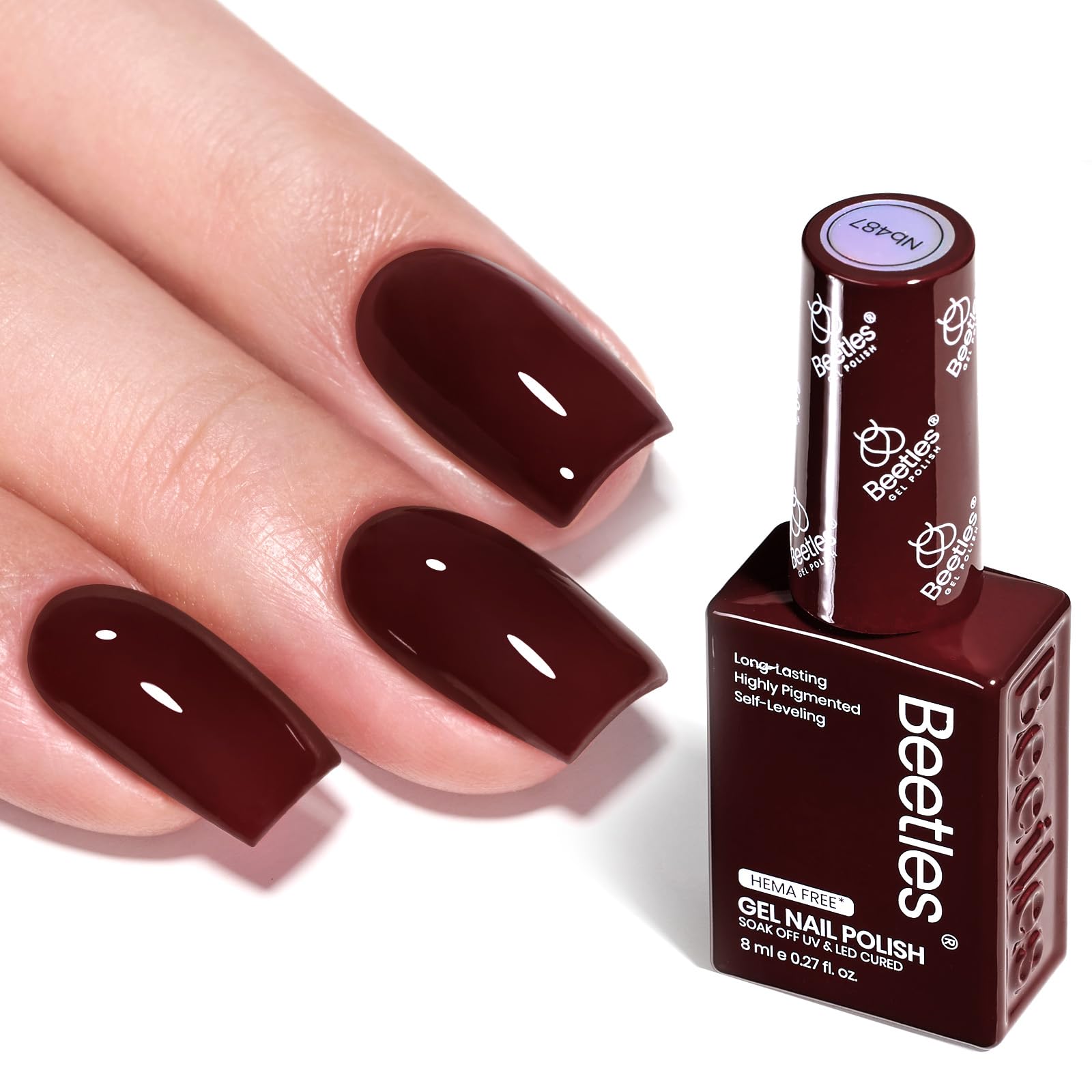 Beetles Burgundy Gel Polish merlot wine bottle shows rich color and long-lasting shine