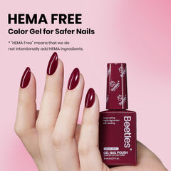 Beetles Burgundy Red gel polish brush applying smooth, even color