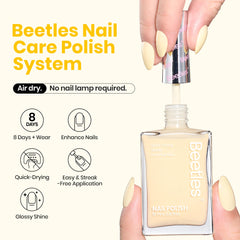 Beetles Butter Yellow polish brush stroke on nail, quick-dry finish suggested.