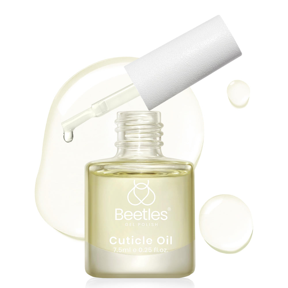 Beetles Cuticle Oil bottle with brush for easy application and nourished nails.