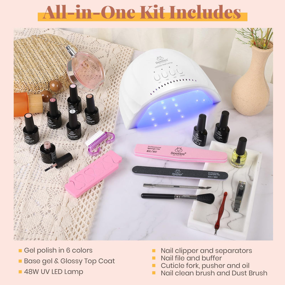 Beetles Gel Nail Polish Kit in use with automatic sensor lamp during home manicure.