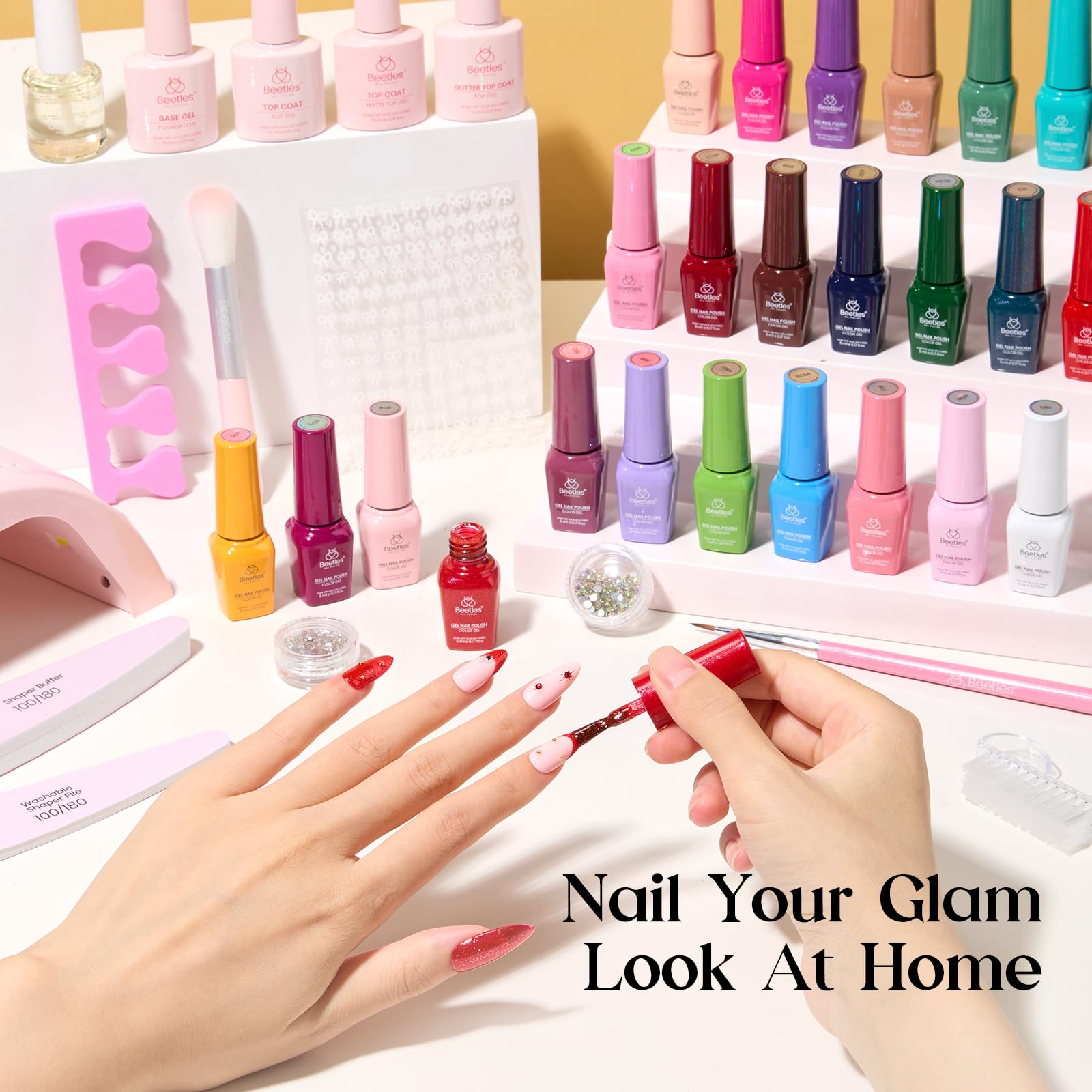 Beetles glitter top coat bottle adds sparkle and depth to designs.
