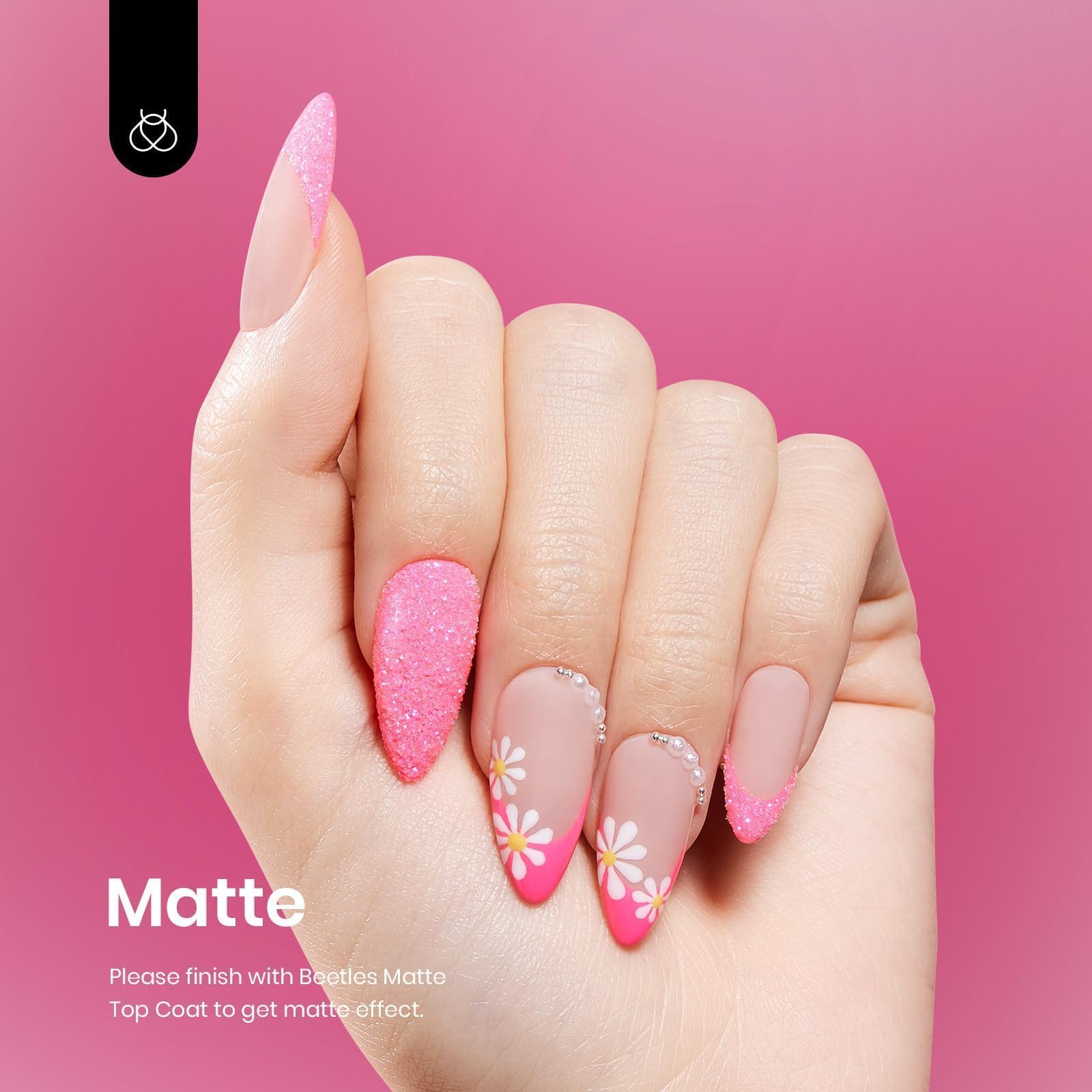 Beetles gift idea for her featuring vibrant pink manicure inspiration.