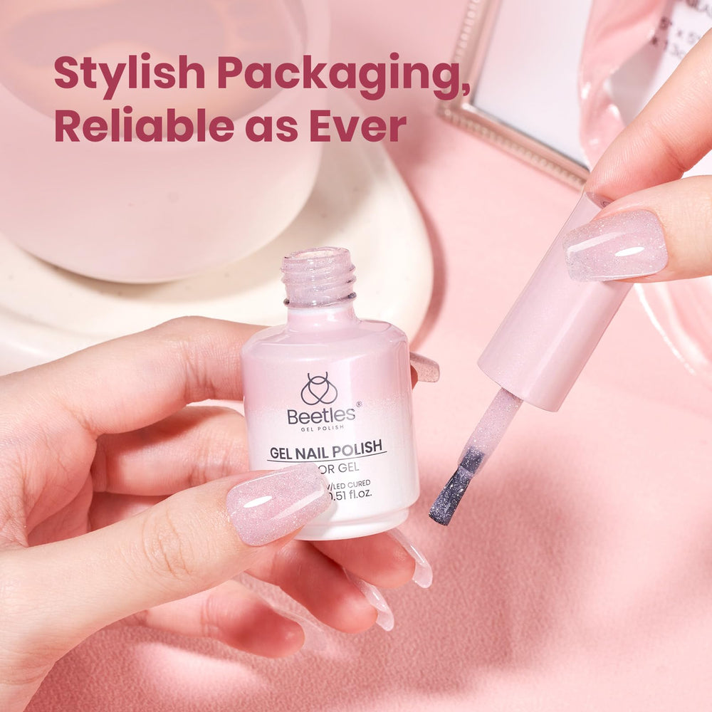 Beetles Glitter Pink Gel Nail Polish glossy finish on nails after curing with lasting shine.
