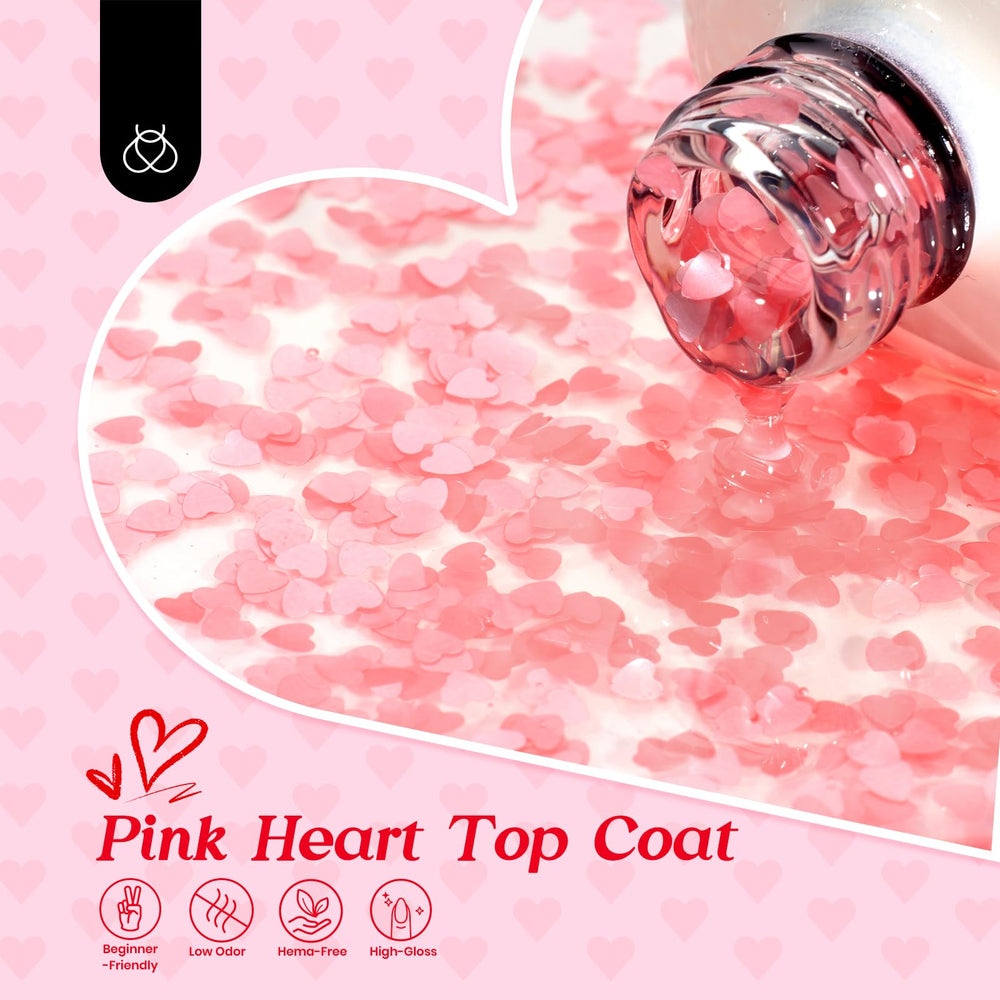 Beetles Pink Heart Top Coat application close-up showing glossy seal.