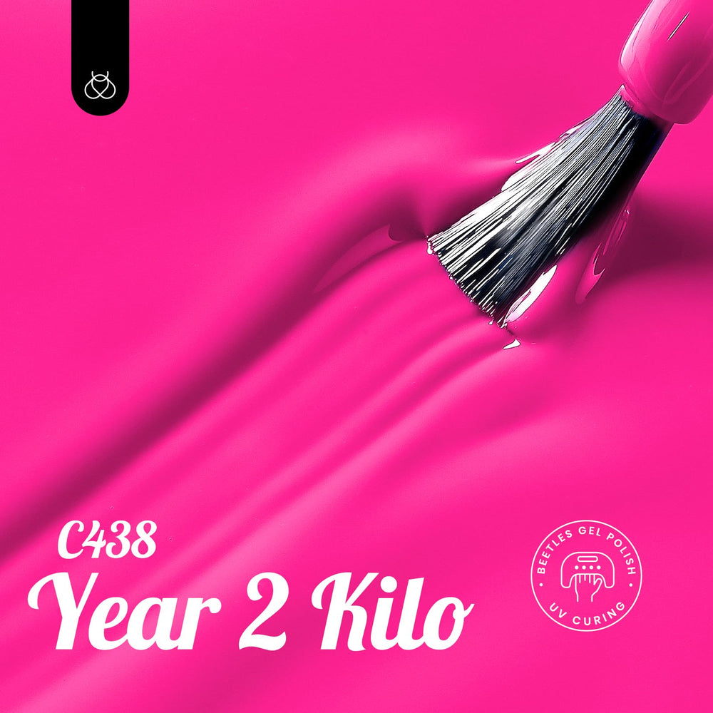 Beetles hot pink gel polish applied with precision brush for smooth glossy results.