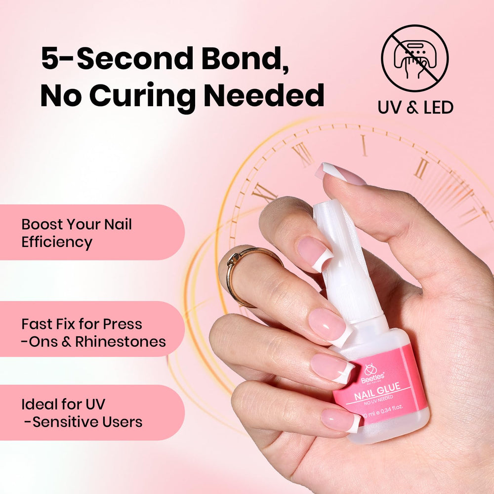 Beetles Press On Nail Glue 10ml quick-drying formula in use on fake nails.