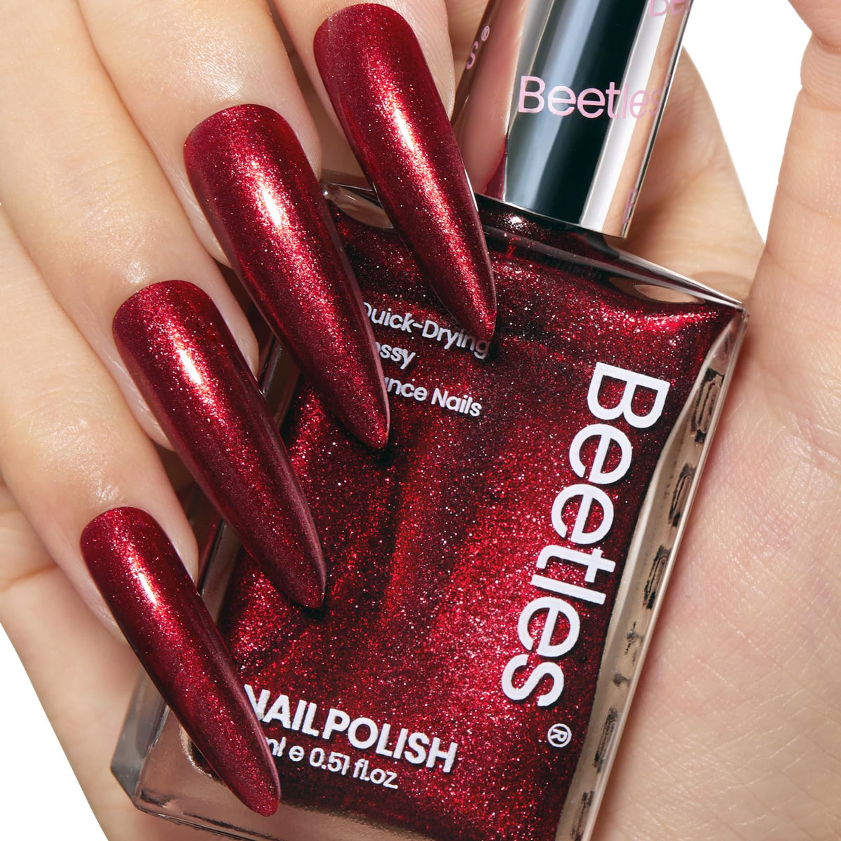 Beetles Ruby Radiance red glitter nail polish bottle for festive nails.