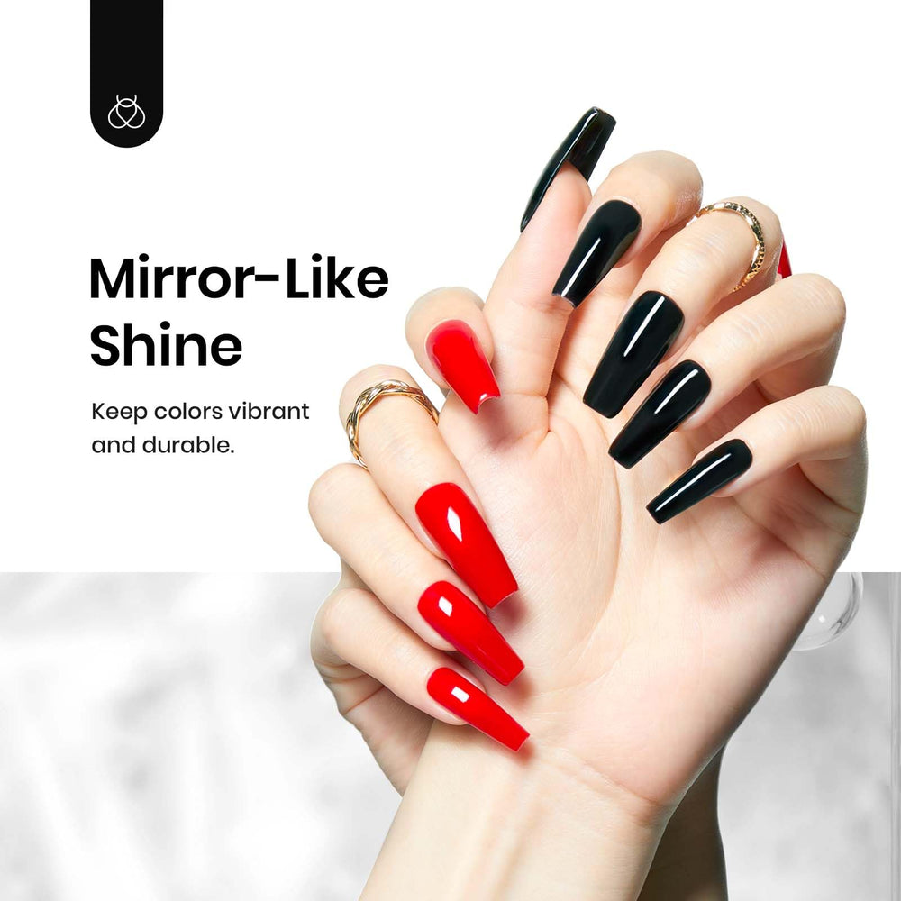 Beetles glossy finish on nails under lamp demonstrates long-lasting shine