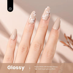 Beetles Nude Gel Polish brush application delivering smooth, even color before curing.