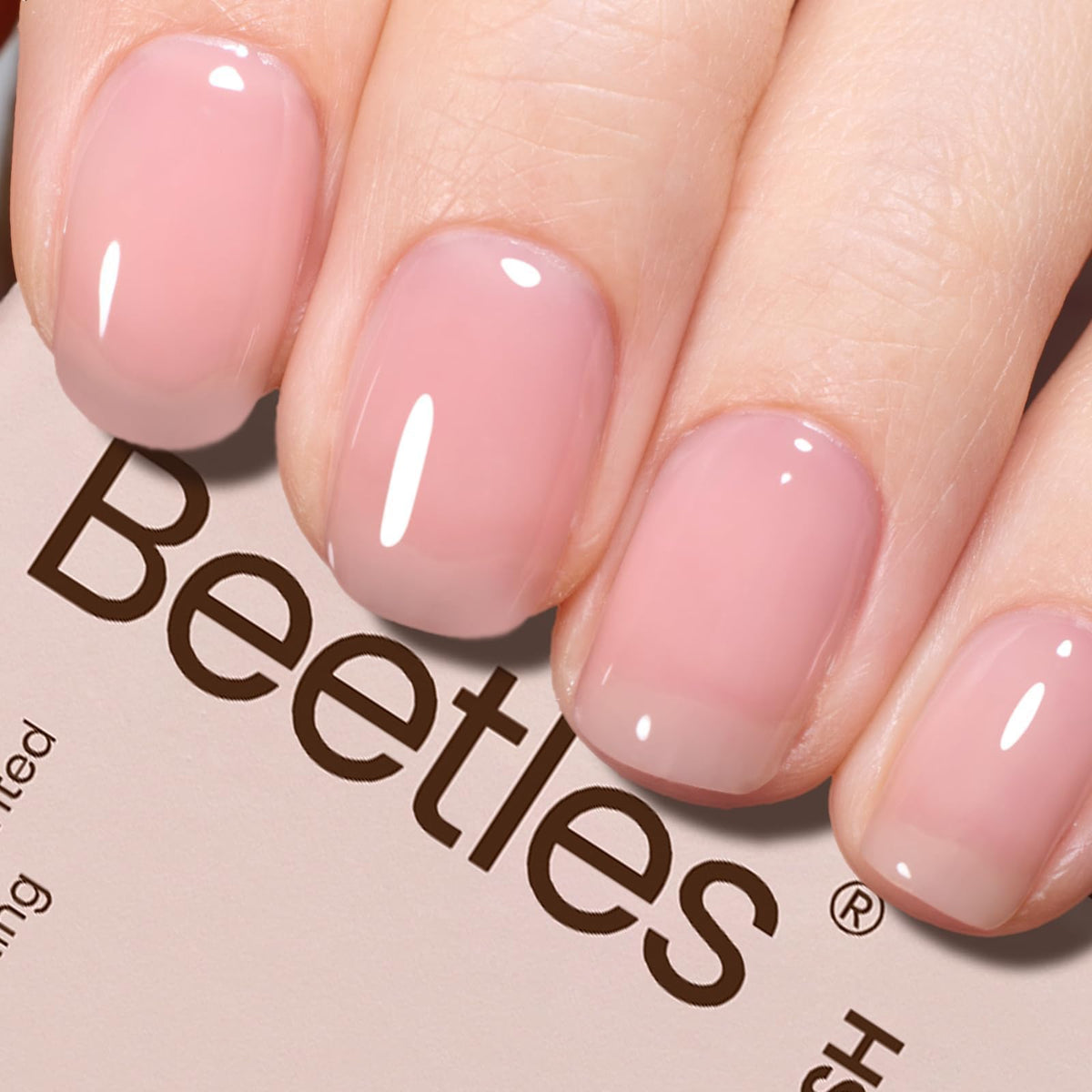 Beetles Nude Pink Gel Polish bottle showing versatile nude color for nails.