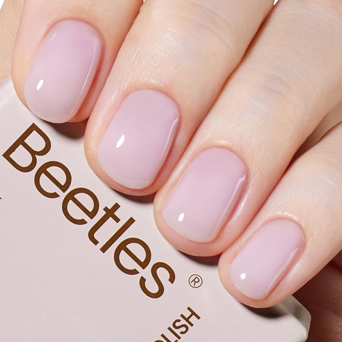 Beetles Nude Gel Polish bottle in nude purple jelly for a delicate, glossy look.