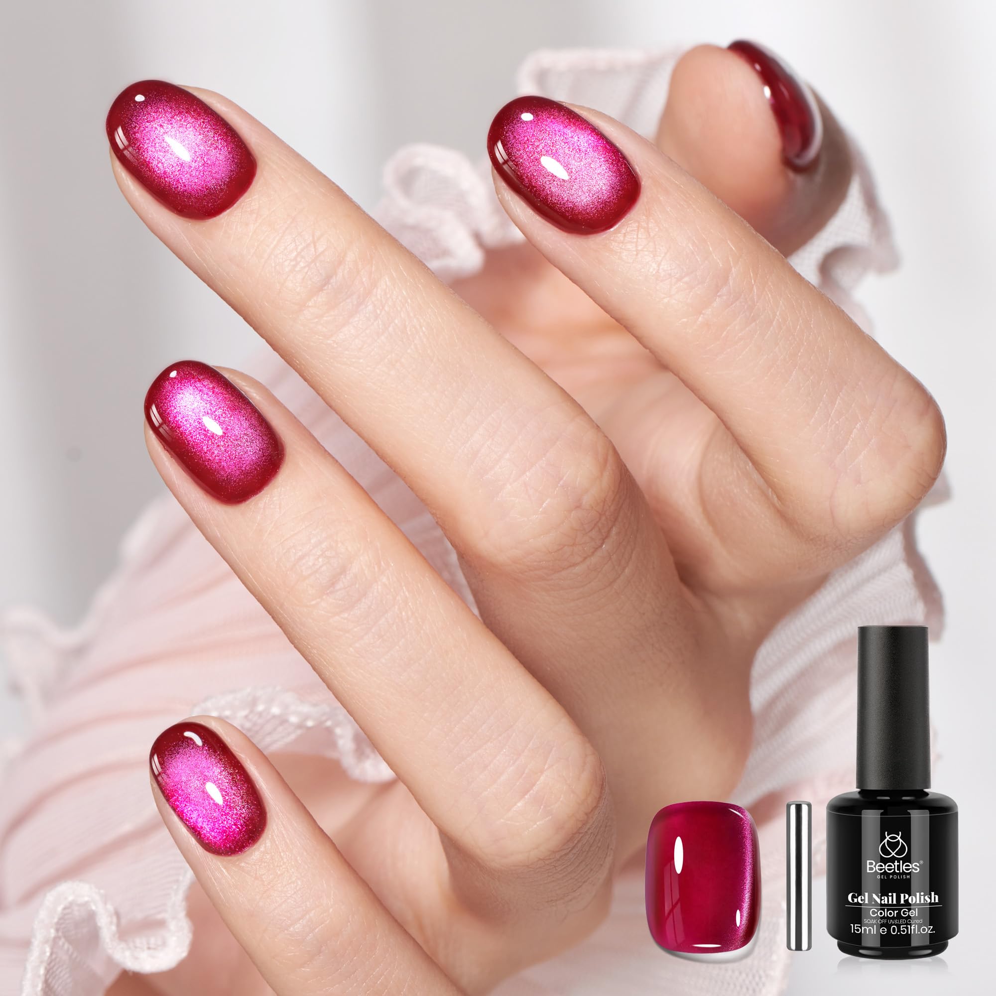Beetles Pink Cat Eye Gel Polish bottle showing shimmering cherry pink cat eye finish.
