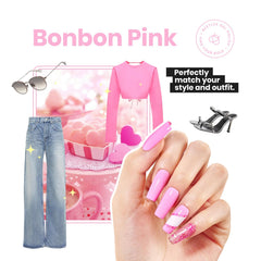 Beetles Pink Nail Polish on nails for festive manicure.