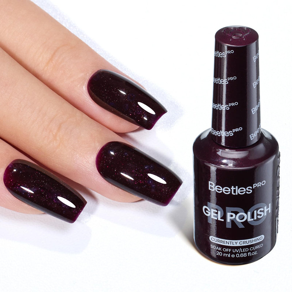 Beetles Pro Currently Crushing Burgundy Glitter bottle showing rich color payoff.