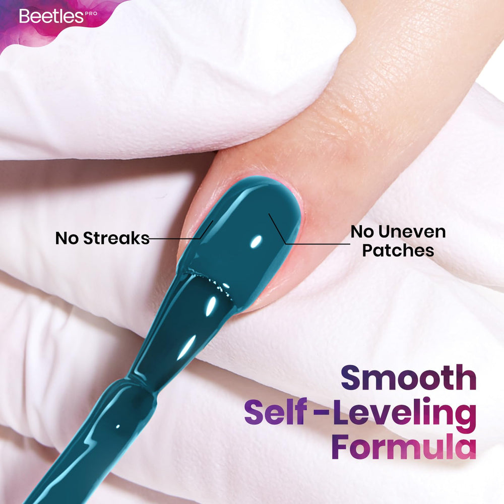 Beetles Pro turquoise gel polish curing under UV lamp for salon-ready results.