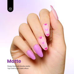 Beetles Purple Gel Nail Polish manicure on nails with soft purple tones.