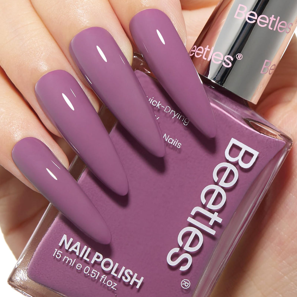 Beetles purple nail polish bottle with quick-dry long-lasting color.