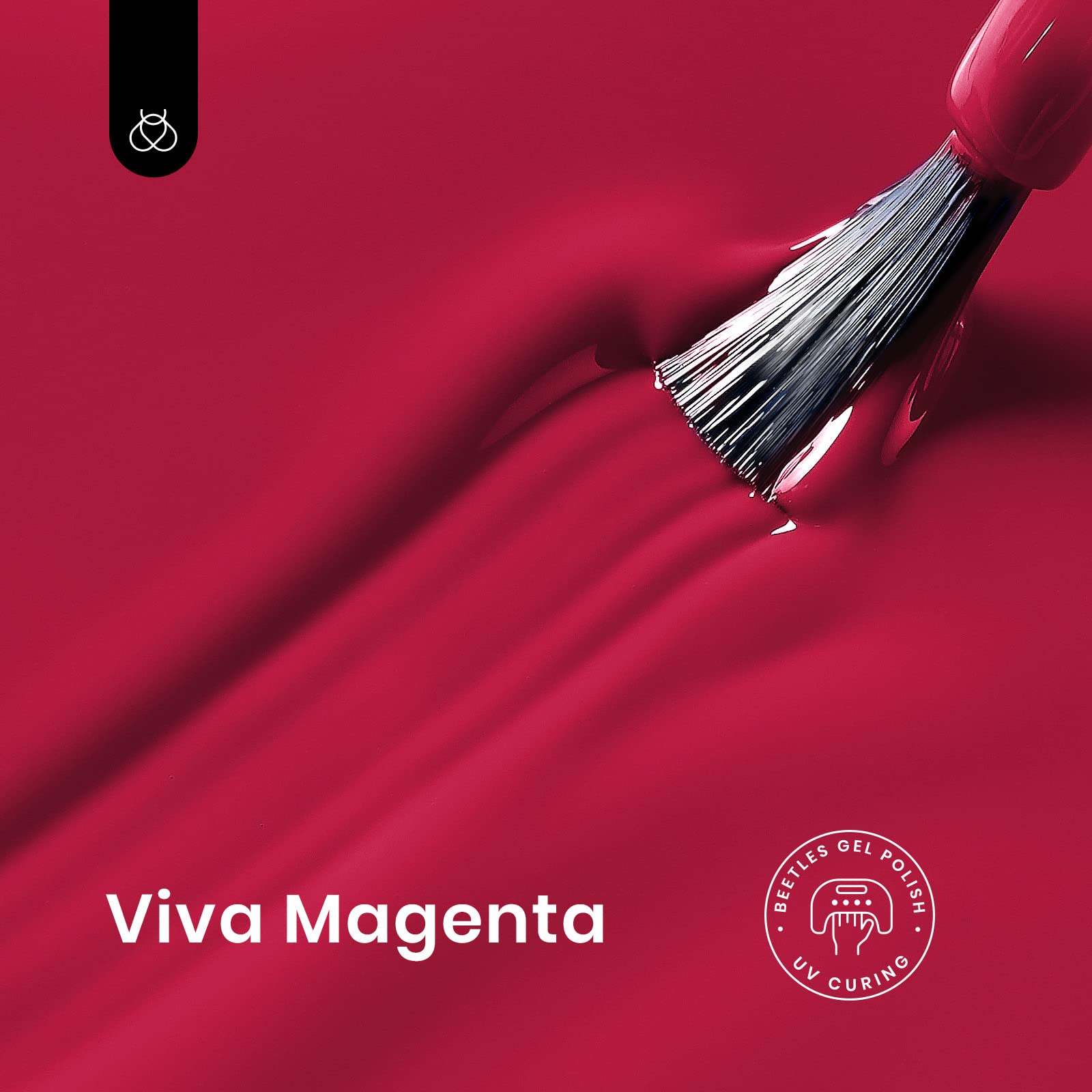 Beetles gel polish brush applying burgundy shade for smooth, even color.