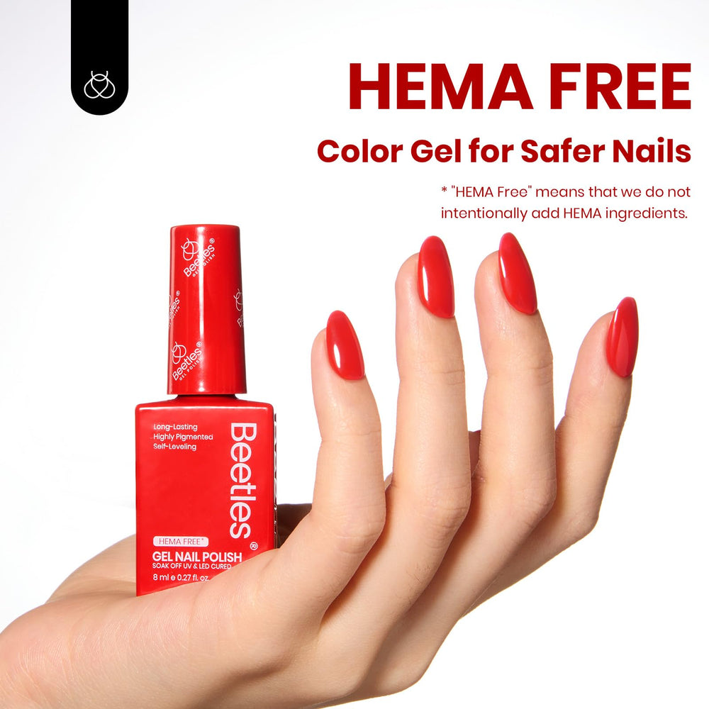 Beetles red gel polish under UV/LED lamp for quick, durable color.