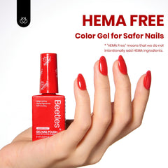 Beetles red gel polish under UV/LED lamp for quick, durable color.