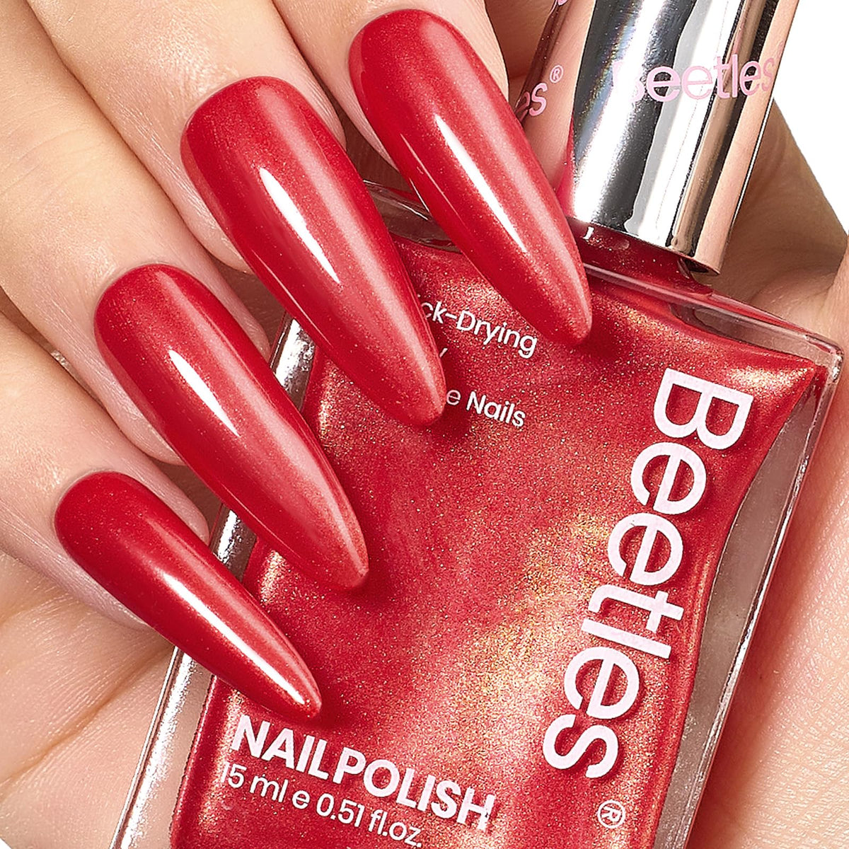 Beetles Red Nail Polish bottle with quick-dry glitter for effortless at-home manicures.