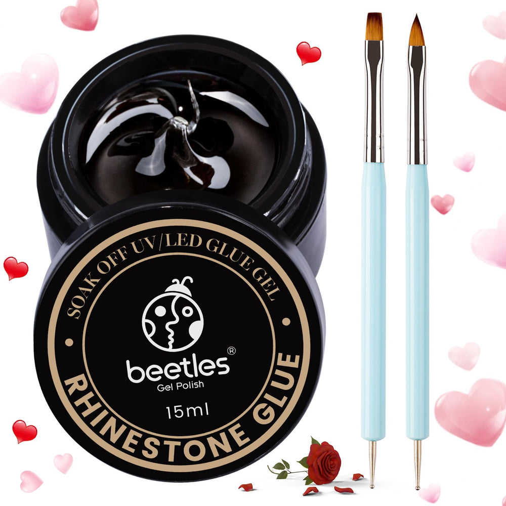 Nail art gems secured with Beetles Rhinestone Glue for versatile decoration.