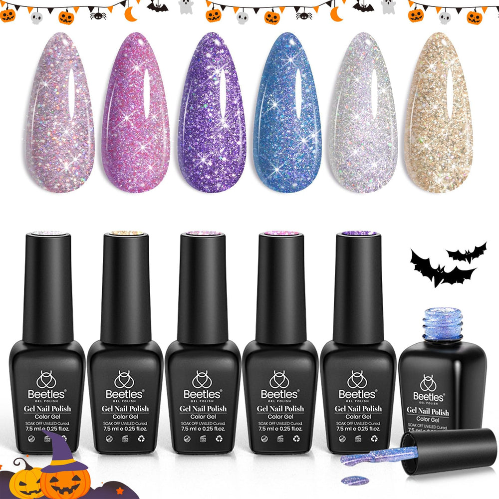 Beetles silver-gold flakes sparkle on nails in dim light.