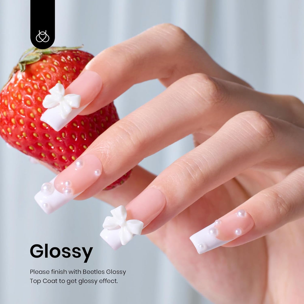 Beetles White Gel Polish on nails demonstrates full coverage and glossy finish.