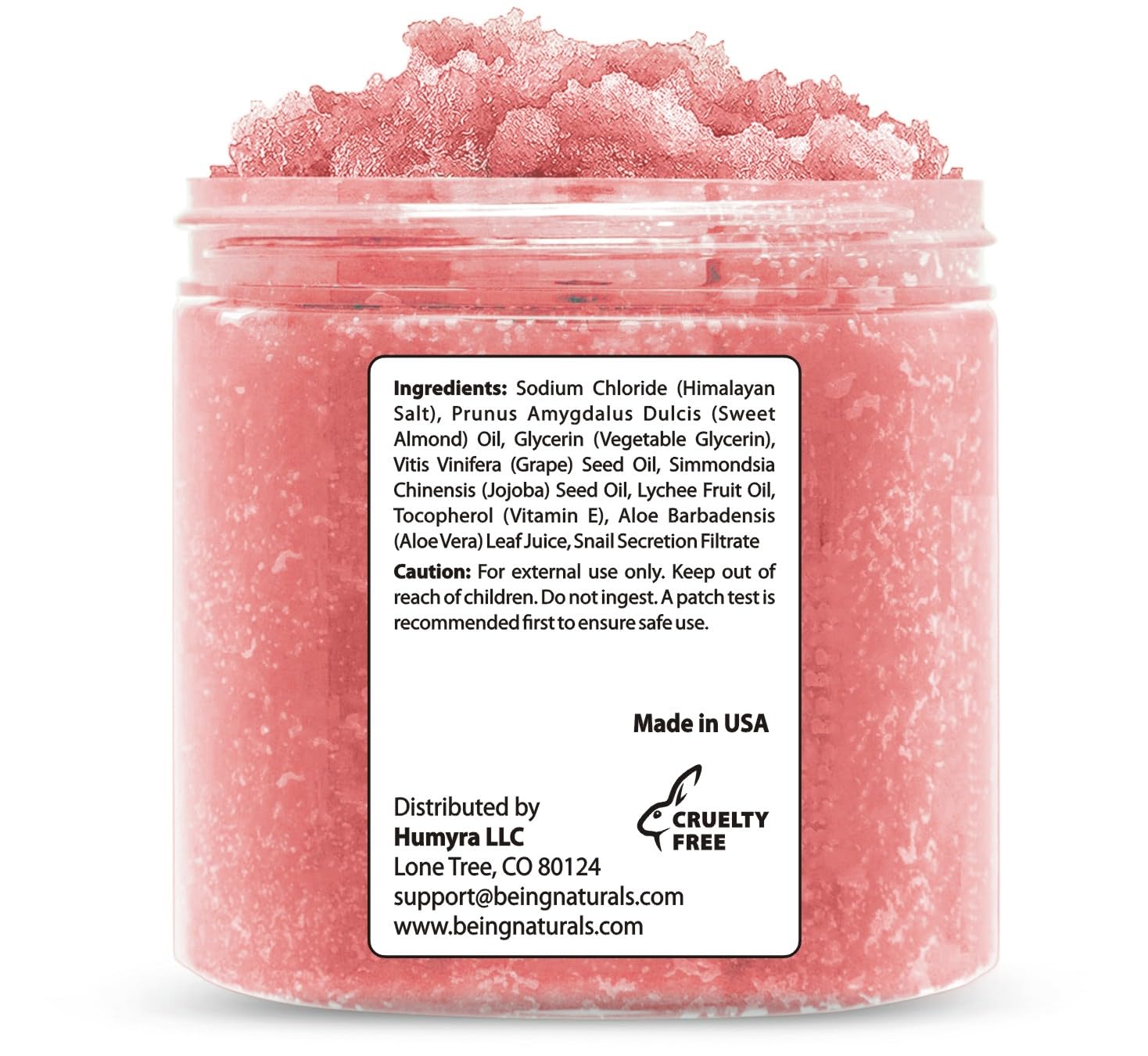 Being Naturals scrub texture close-up highlighting mineral crystals for deep cleansing.