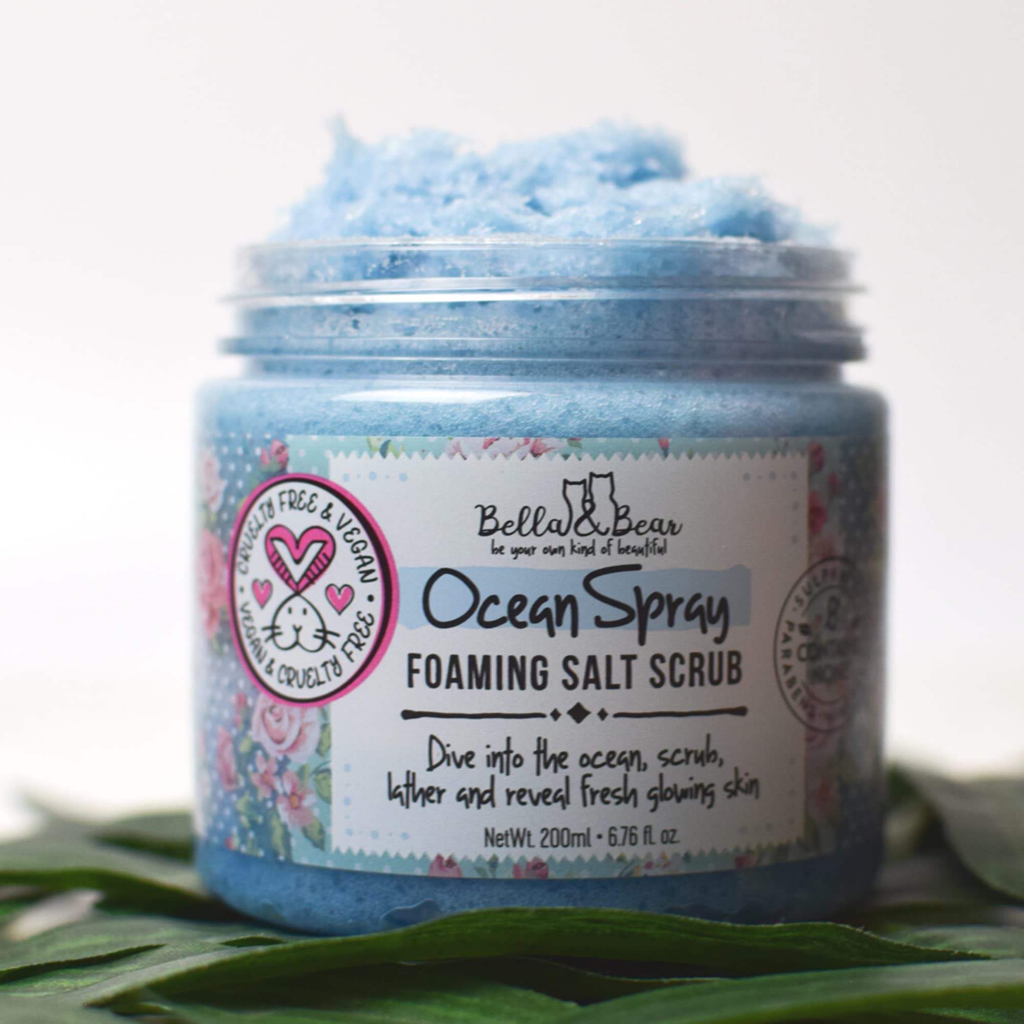 Bella and Bear Ocean Spray Scrub applying on damp skin for gentle exfoliation.
